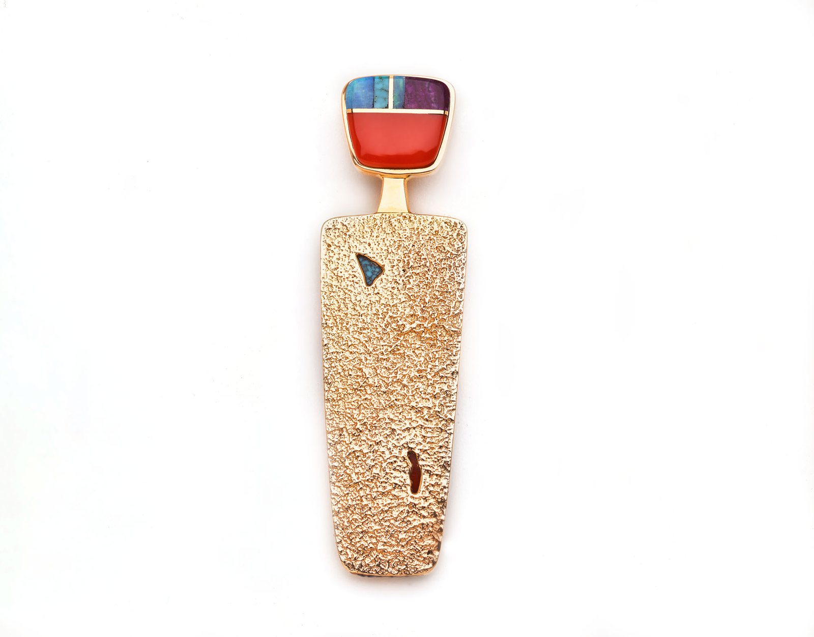 Verma Nequatewa, “Hopi Maiden Pendant,” a textured gold pendant topped with inlaid red and blue stone