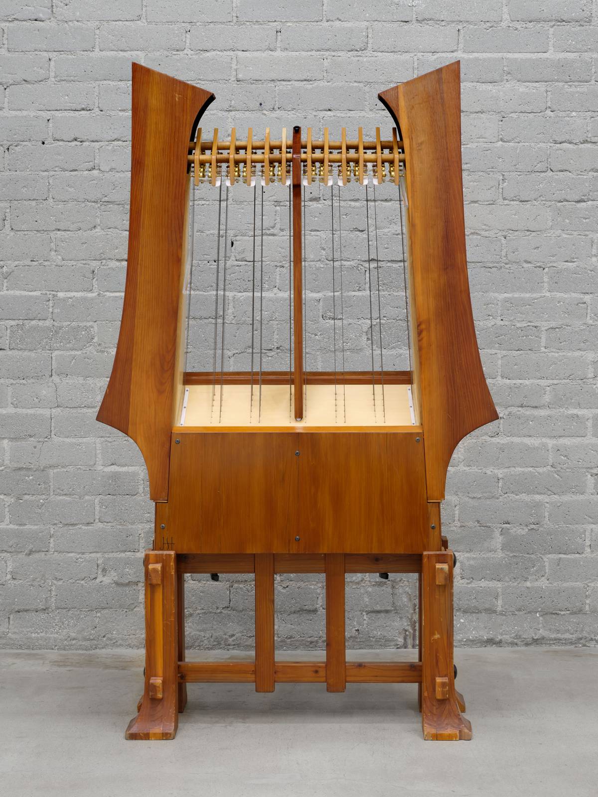 Harry Partch’s Kithara I, a tall wooden stringed instrument on a stand