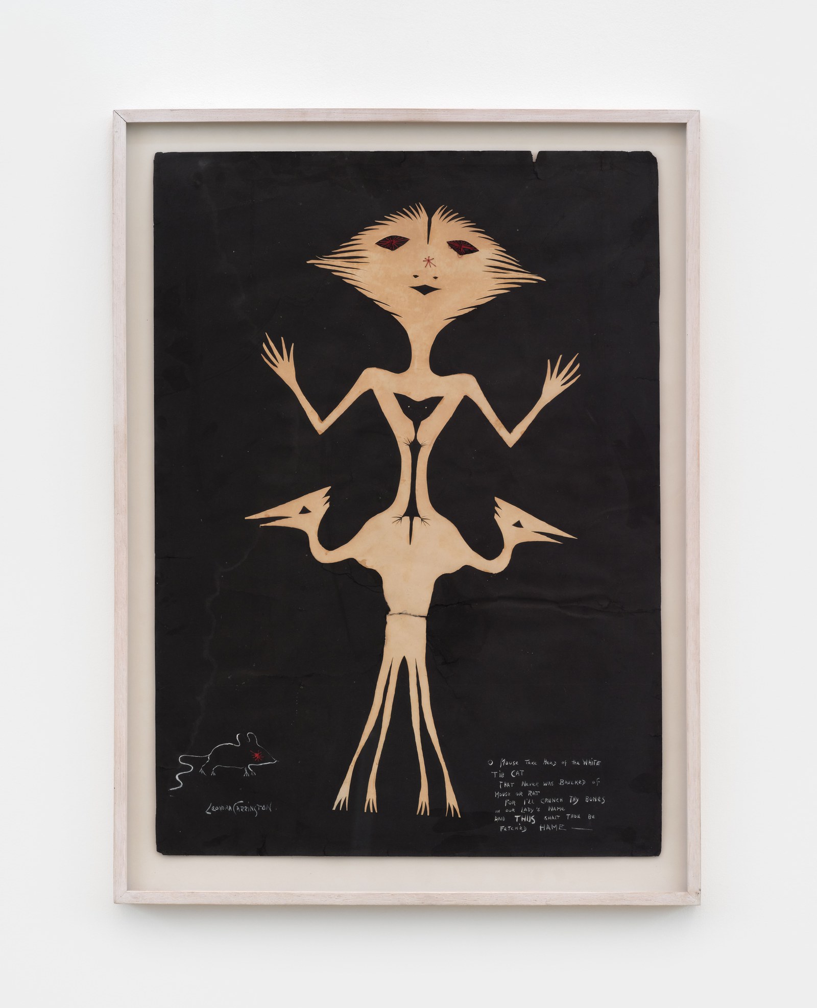 Leonora Carrington cut paper figure with bird heads on a black ground, a small mouse and handwritten text beside it